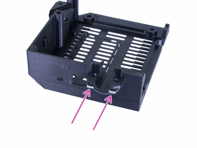 Remove 2 M3nS nut from extruder cable holder